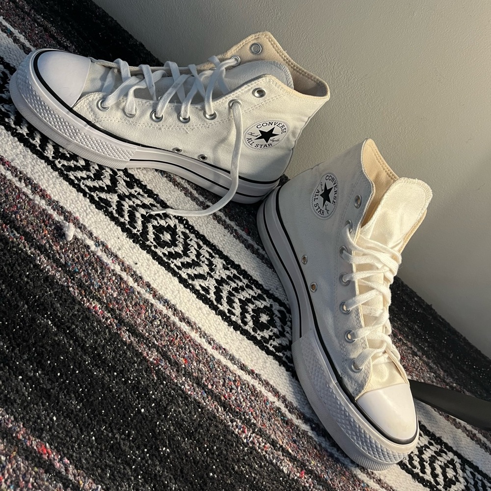 White Converse platform Chuck Taylor hightop sneakers. Women’s size 8.